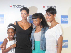 Gorgeous Nicole Murphy in David Meister with daughter Bria in white Armani Exchange dress and younger daughters