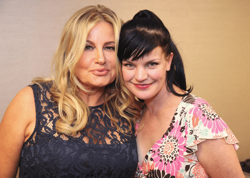 Actresses Jennifer Coolidge (L) and Pauley Perrette (R) catch up backstage during the American Humane Association Hero Dog Awards 2013 held at the Beverly Hilton Hotel on Saturday, Oct. 5, 2013, in Beverly Hills, California. 
