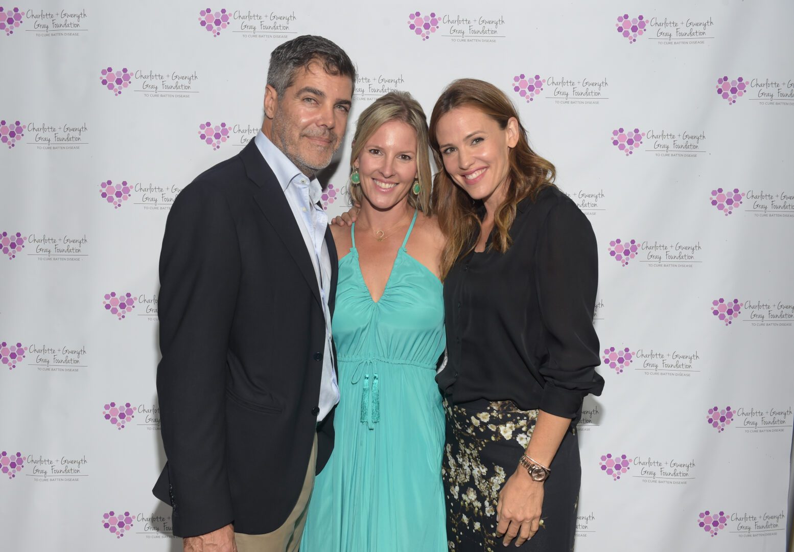 Film producer Gordon Gray, Kristen Gray, and actress/host Jennifer Garner attend The Charlotte And Gwenyth Gray Foundation To Cure Batten Disease Fundraiser